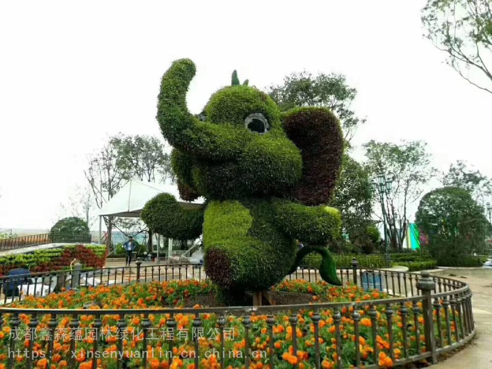 成都大型仿真立体景观节日主题雕塑厂家 假植物绢花绿雕造型