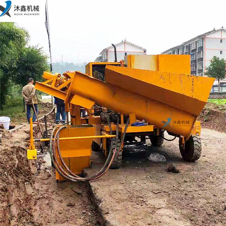 沐鑫自走輪胎式排水溝滑模成型機路肩滑膜攤鋪機