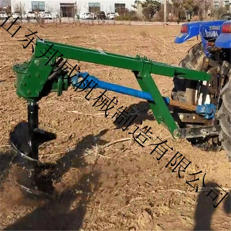 四轮拖拉机带挖坑机农用植树芹菜打洞地钻机螺旋式果树打坑机
