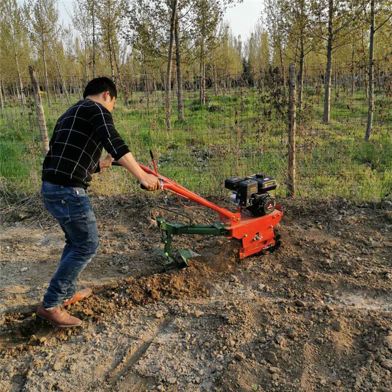 宏泰单履带式翻转犁地机 家用手扶耕耘翻地机 柴油电启动链轨翻地机