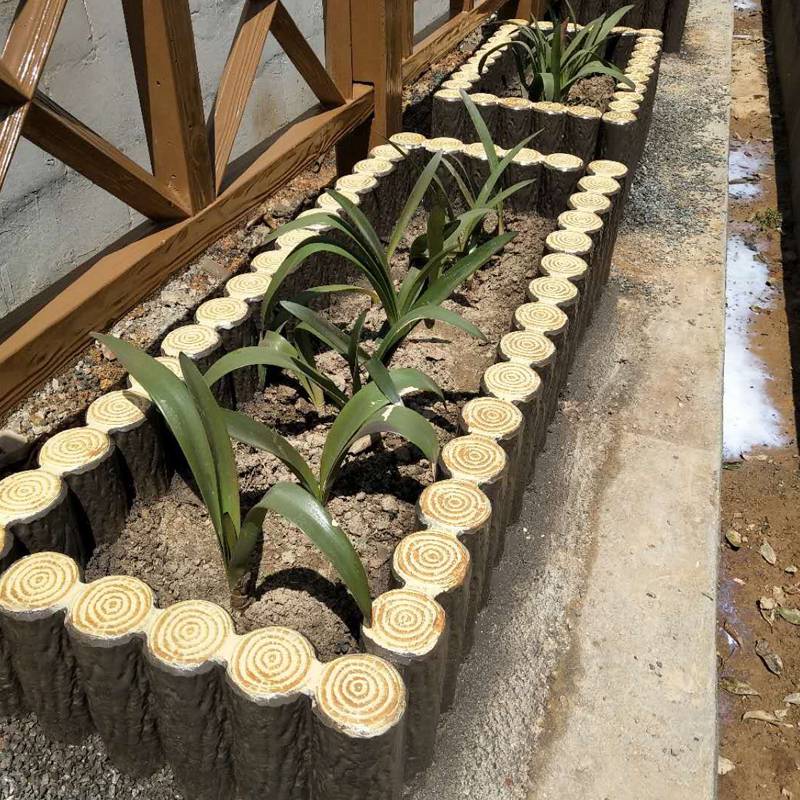 景观水泥仿木树桩混凝土仿木树桩石围栏仿木桩围栏厂家