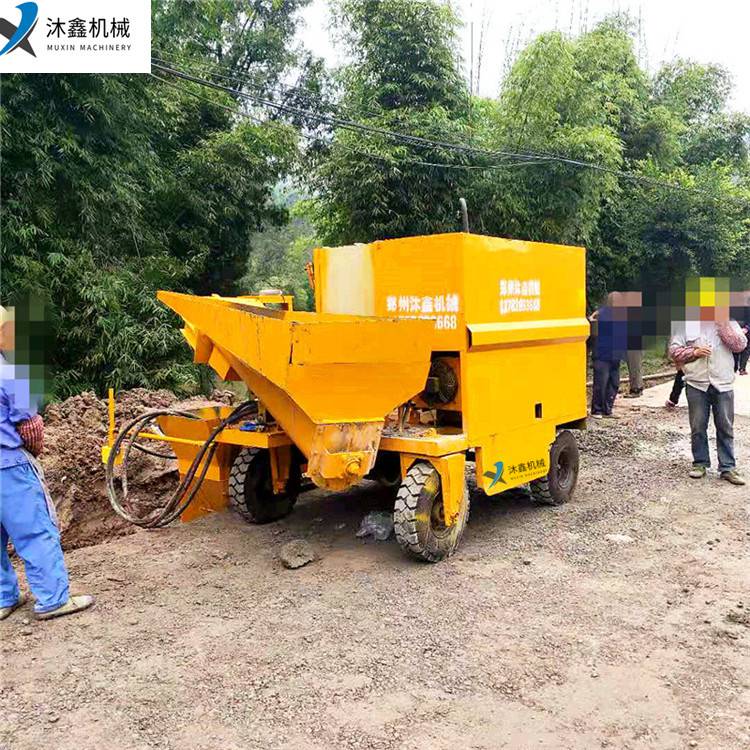 沐鑫自走輪胎式排水溝滑模成型機路肩滑膜攤鋪機